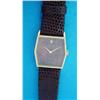 Image 1 : A lady's 18ct gold Rolex Cellini wrist watch, with angular case and tigers eye dial....