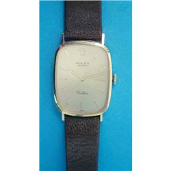 A gentleman's 18ct gold Rolex Cellini wrist watch, with rounded rectangular case, gilt dial and b...