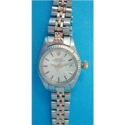 A lady's pink and gold steel Rolex Oyster Perpetual Date wrist watch, with matching bracelet....