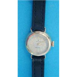 A lady's 18ct gold Rolex Precision wrist watch, with baton numerals....