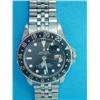 Image 1 : A gentleman's steel Rolex Oyster Perpetual GMT-Master wrist watch, with blued bezel and black dia...