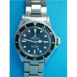 A gentleman's steel Rolex Oyster Perpetual Submariner wrist watch, with matching bracelet....