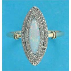 A gold opal and diamond set marquise cluster ring...