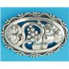 Image 1 : A Georg Jensen sterling silver openwork oval brooch, depicting berries and leaves, No.177A...