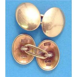 A pair of 18ct gold plain oval cufflinks, 15.7grms...