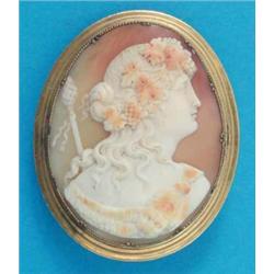 A Victorian shell cameo brooch, carved with a profile study of a bacchante, in gilt metal frame,...