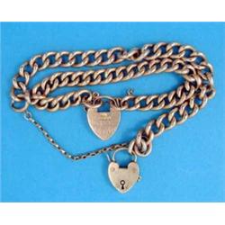 Two 15ct gold curblink bracelets, with padlock clasps, total weight 38.2grms...