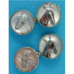 A pair of 18ct gold mounted reverse intaglio crystal cufflinks, painted horse heads, (a.f)...