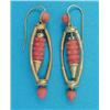 Image 1 : A near pair of gold and coral Etruscan design pendant earrings, with carved coral swing centres a...