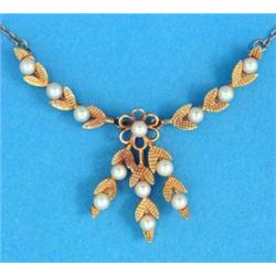 A modern pendant necklace, designed as pairs of leaves, each with a central cultured pearl, on 9c...