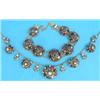 Image 1 : An Eastern gilt metal necklace, designed as 5 bombe shape clusters set semi precious gem stones,...