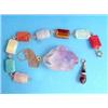 Image 1 : A carved amethyst pendant, in the form of a fish, a flexible bracelet of 8 rectangular specimen h...