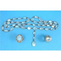 A graduated moonstone necklace spectacle set in white metal with attached matching 3 stone drop,...