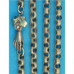 A 19th century gold muff chain, of circular milled links with two colour gold 'gloved hand' clasp...