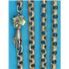 Image 1 : A 19th century gold muff chain, of circular milled links with two colour gold 'gloved hand' clasp...