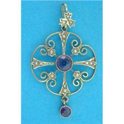 An Edwardian 9ct gold circular open scroll work pendant, set amethysts and seed pearls...