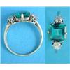 Image 1 : An emerald and diamond ring, the square cut emerald flanked by 2 round old brilliant cut diamonds...