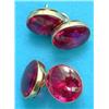 Image 1 : A pair of gold mounted cufflinks, set oval cabochon synthetic rubies (cased)...