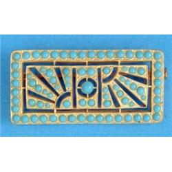 A gilt metal Art Deco design rectangular brooch, with geometric piercework set turquoise pastes...