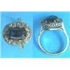 Image 1 : An 18ct gold, sapphire and diamond oval cluster ring...