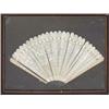 Image 1 : A 19th century Chinese fan, having carved, pierced ivory guards, the carved ivory sticks depictin...