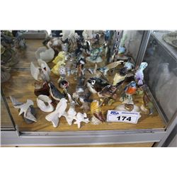 APPROX TWENTY-FOUR COLLECTABLE BIRD ORNAMENTS