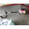 Image 1 : Ryobi gas powered weed eater - used