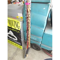 4 Hockey sticks - used
