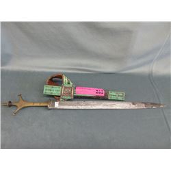 Brass handled knife with partial sheath