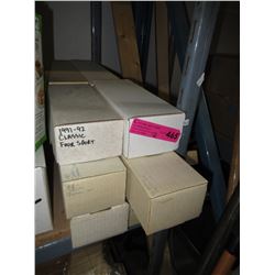 12 Boxes of assorted sport trading cards