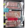 Image 1 : Last 3 issues of the Canadian $2 bills
