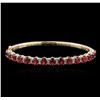 Image 1 : 14KT Yellow Gold 7.95ctw Rubies and Diamond Bangle Bracelet