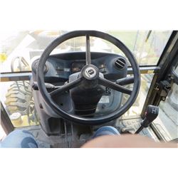 2008 New Holland Model B95B  FWA, Back hoe extend boom, front mount loader 8 ft bucket Shuttle shift