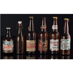 Six Beer Bottles