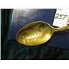 Image 2 : "Hull/Iowa" Souvenir Spoon depicting a large fish on the handle and a Sea shore scene with sail boat