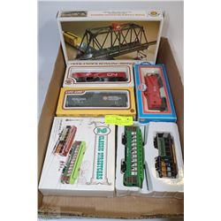 7 MODEL TRAIN CARS & ENGINES WITH AN 18 WHEELER