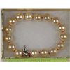 Image 1 : #27-10mm SEASHELL PEARL BRACELET - LIGHT PEACH