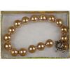 Image 1 : #29-10mm SEASHELL PEARL BRACELET - GOLDEN BROWN