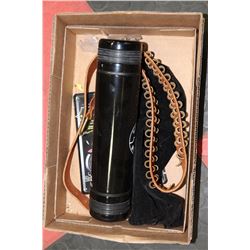 BOX WITH AMMUNITION BELT, METAL WALL PLAQUES AND