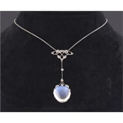 An Art Nouveau Edwardian pendant, set with heart shaped moonstone and rise cut diamonds, acid tes...