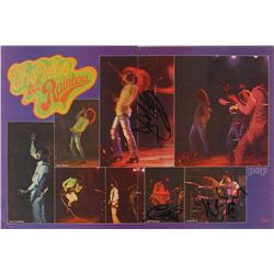 The Who: Daltrey, Entwistle, and Moon Signed Magazine Photograph