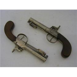 A MATCHED PAIR OF BOX LOCK PERCUSSION MUFF PISTOLS, c.1850, spring bayonets to the underside of t...