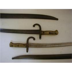 TWO FRENCH CHASSEPOT SABRE BAYONETS, c.1870, yataghan single edged blades, steel hook quillon cro...