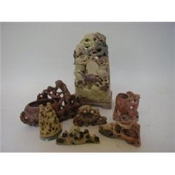 SEVEN SOAPSTONE CARVINGS, mainly birds and beasts amongst foliage (7)   £30-50...