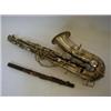 Image 1 : A CASED SAXOPHONE, 'The Elkhart, by Buescher, U.S.A', and a piccolo by Hawkes, London, (2)  £30-4...