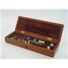 Image 1 : A MAHOGANY CASED PICCOLO, ebony with nickel mounts  £30-40...