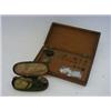 Image 1 : A MAHOGANY CASED SERIES OF CIRCULAR BRASS WEIGHTS, a Georgian small beamscale in japanned case an...