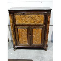 Highly carved Asian liquor cabinet