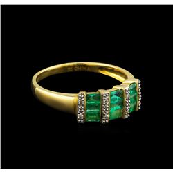 0.84ctw Emerald and Diamond Ring - 14KT Yellow Gold