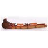 Image 1 : Vintage Asian fisherman in a  canoe, finely carved from